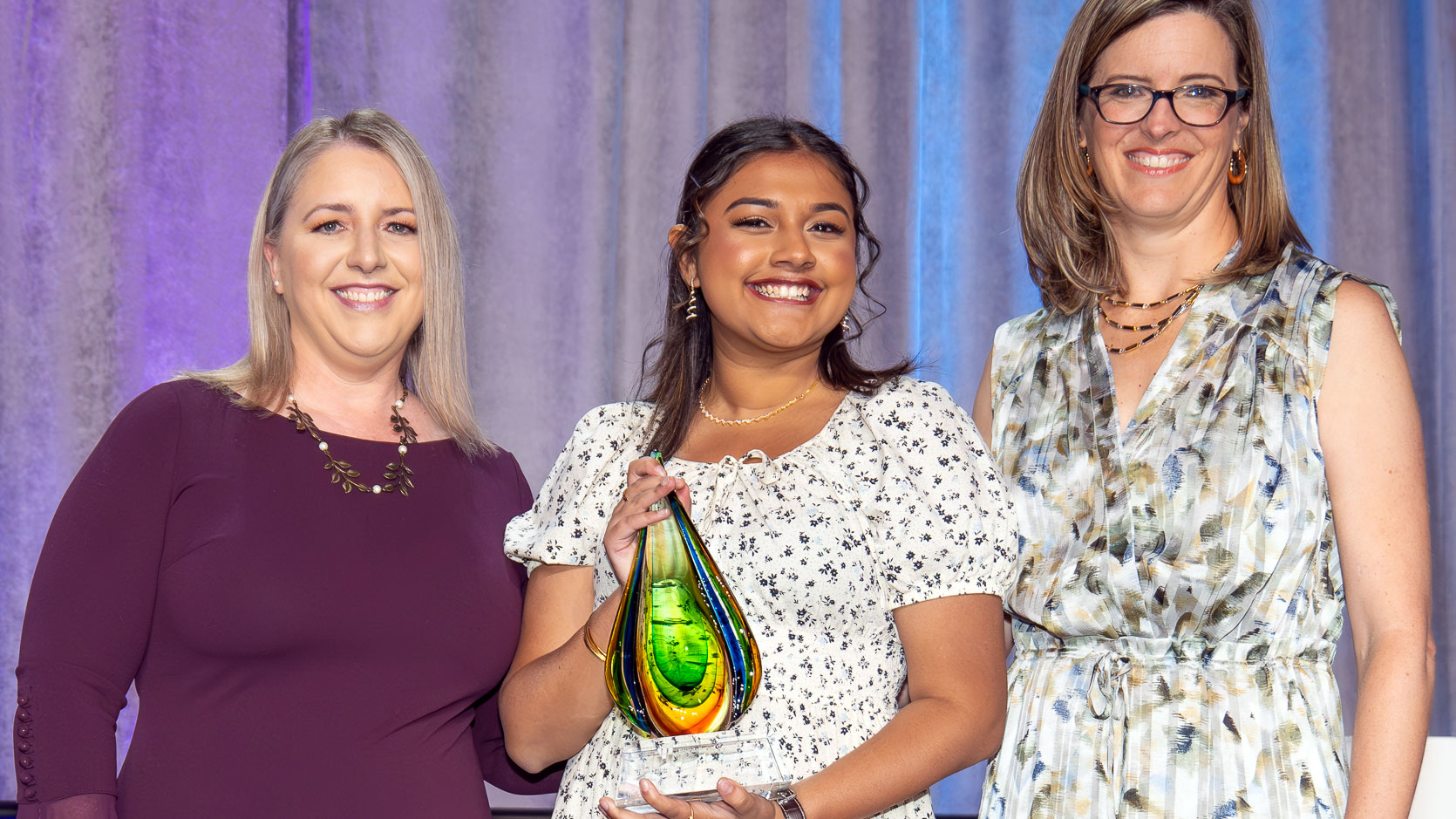 2024 Dottie Lamb Winner, Gitanjali Rao, accepts her award onstage at 2024 Annual Luncheon